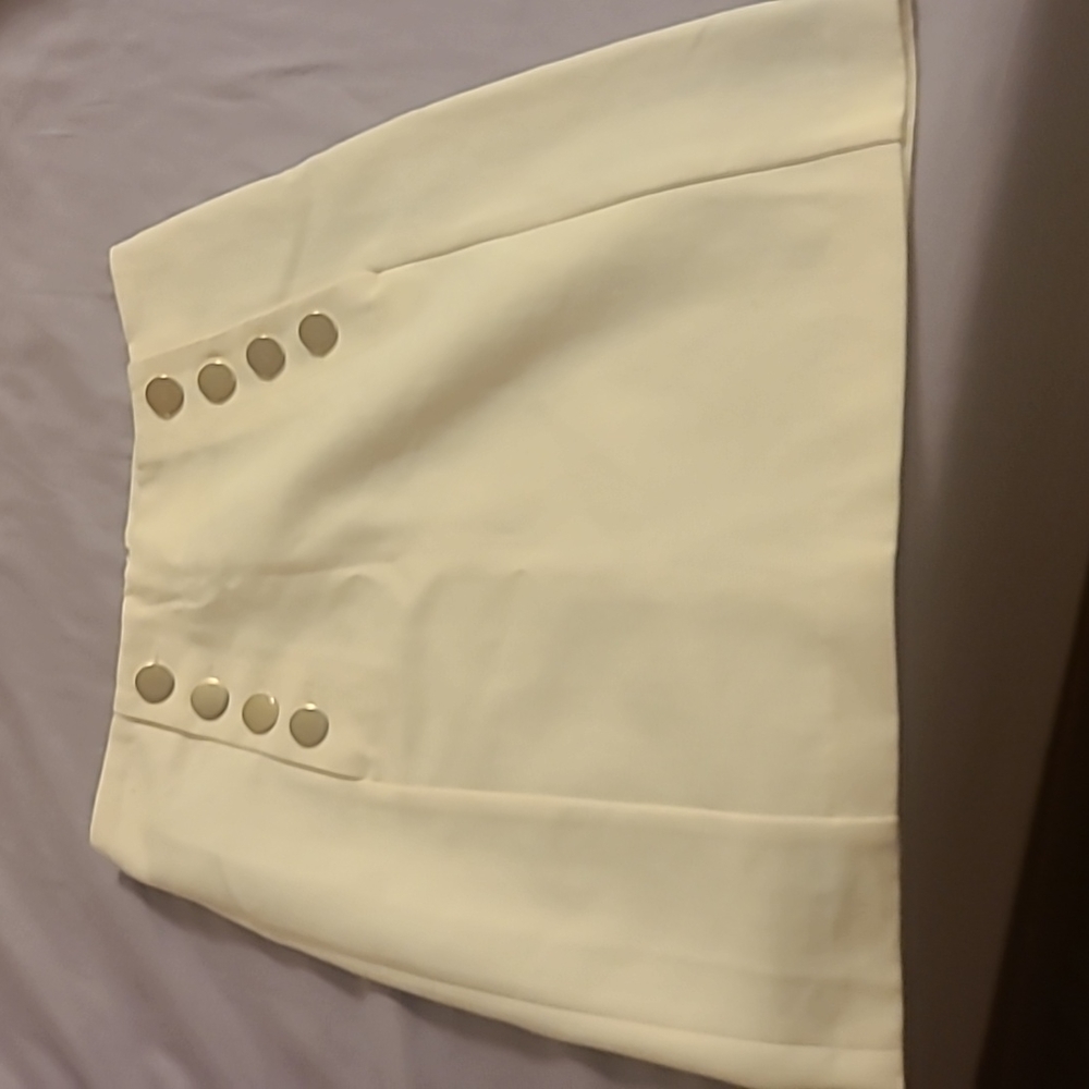 Cream Skirt with reflective buttons